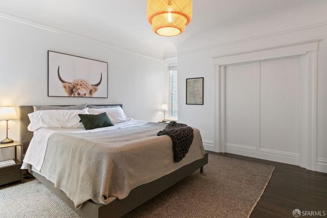 a bathroom with a shower and a mirror