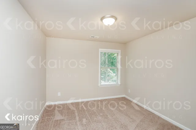 a bathroom with a granite countertop sink a toilet a mirror and shower