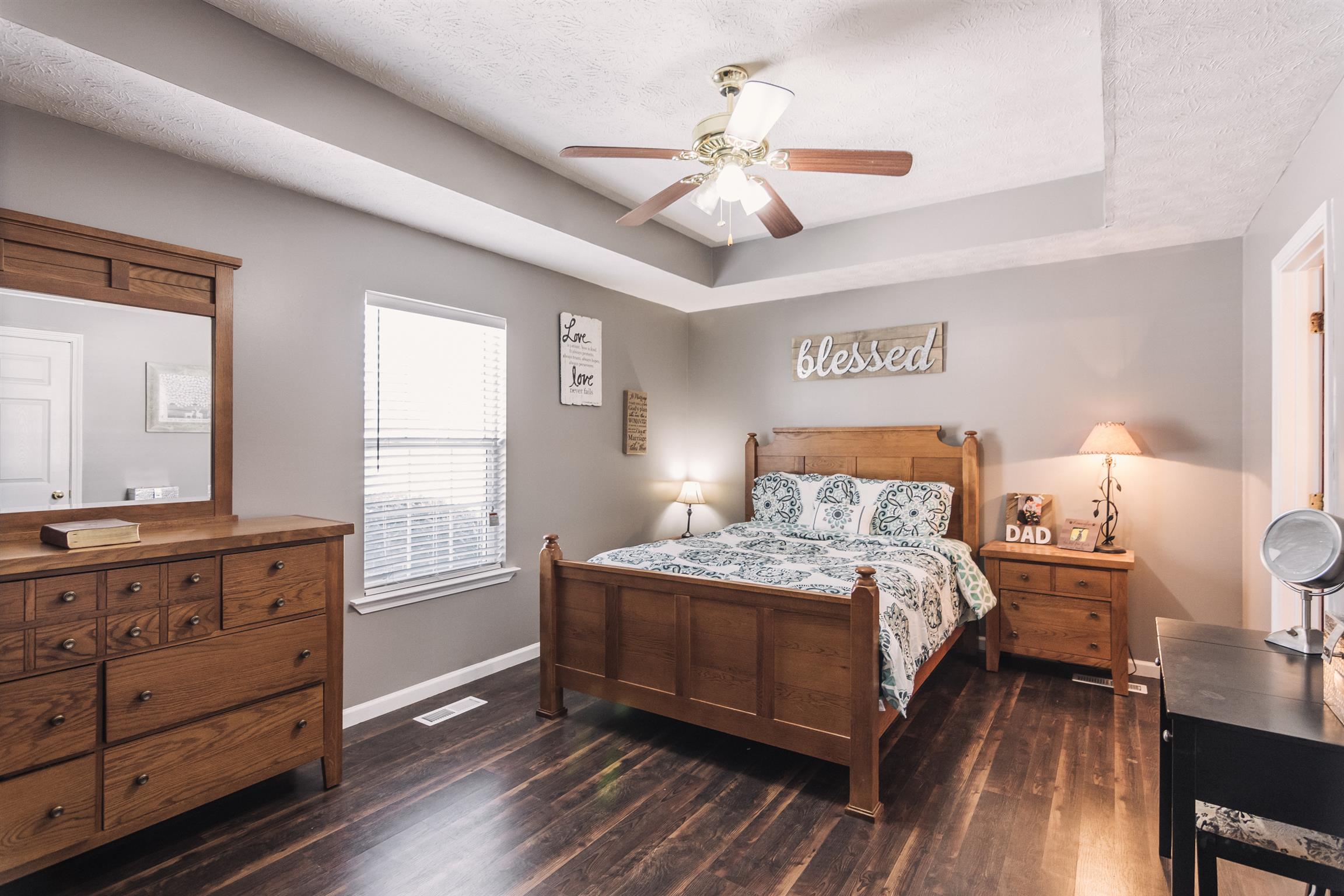399 Corinth Road Portland, TN 37148 - Photo 12 of 28 a bedroom with a bed and window