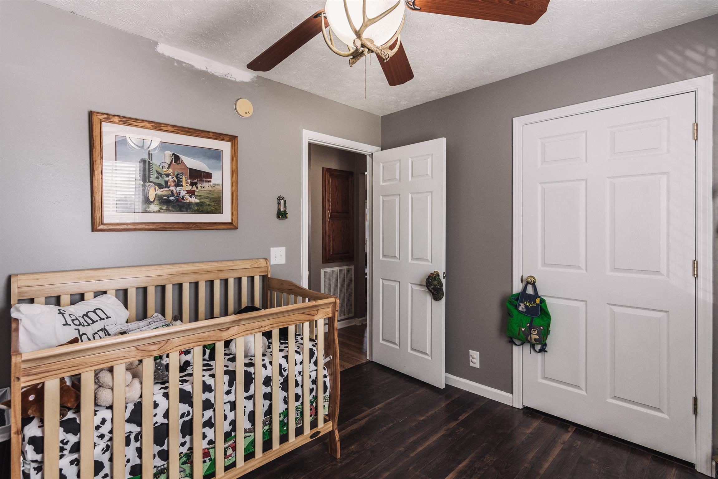399 Corinth Road Portland, TN 37148 - Photo 17 of 28 a view of hallway with wooden floor