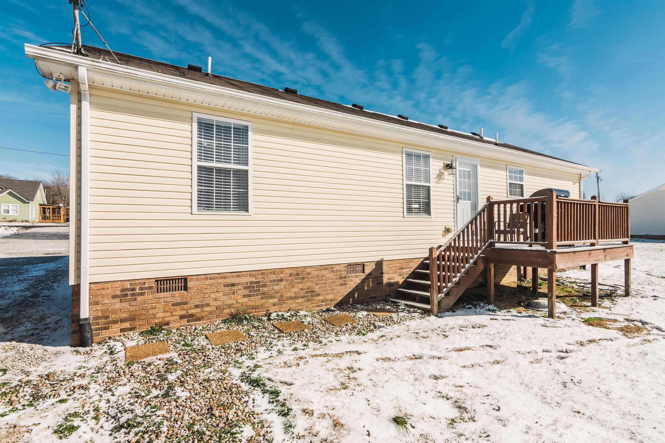 399 Corinth Road Portland, TN 37148 - Photo 20 of 28 a front view of a house with a yard