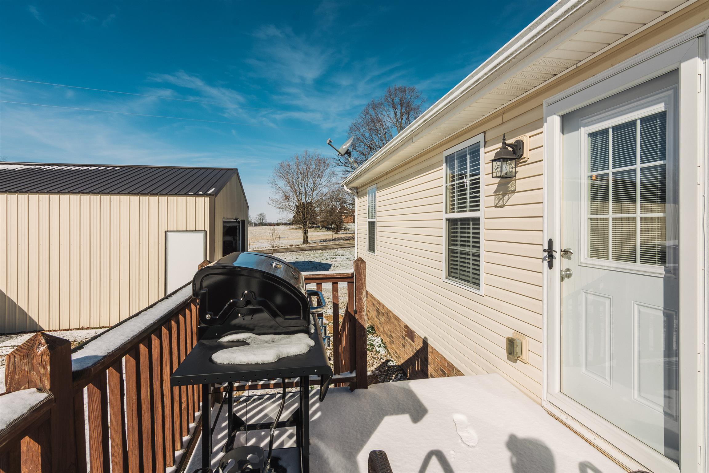 399 Corinth Road Portland, TN 37148 - Photo 22 of 28 a house view with a backyard space