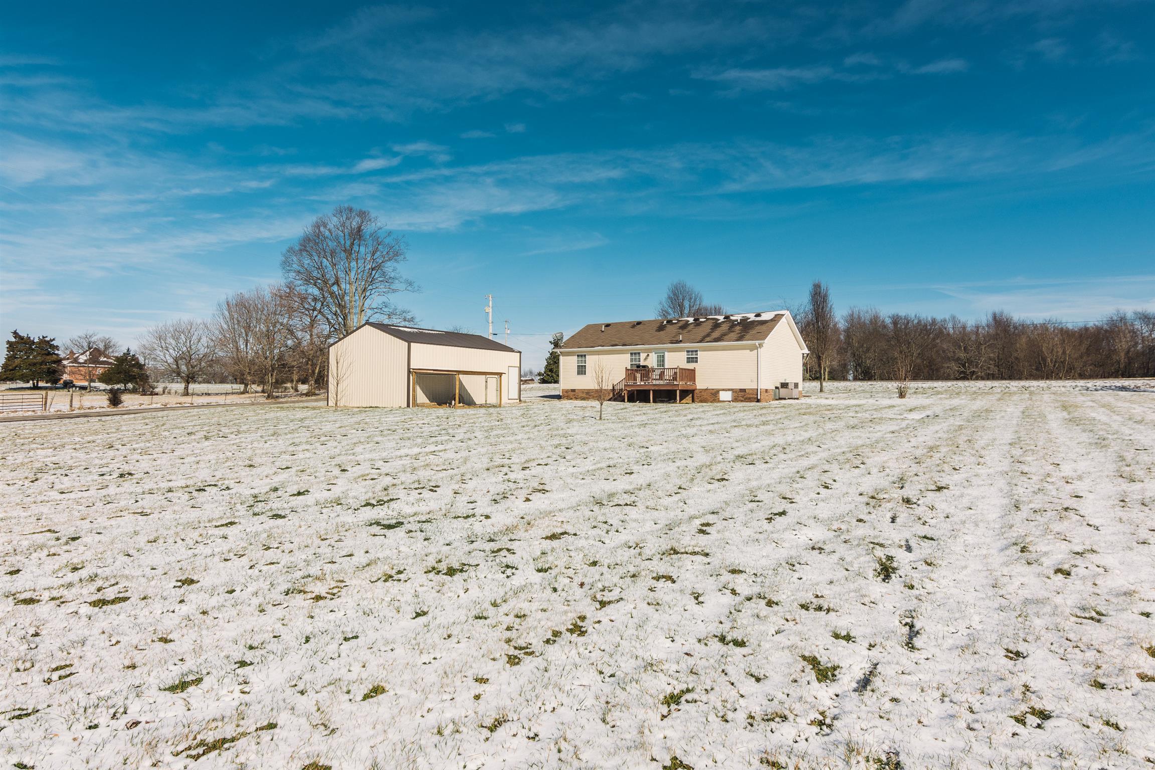 399 Corinth Road Portland, TN 37148 - Photo 25 of 28 a view of a backyard of a house