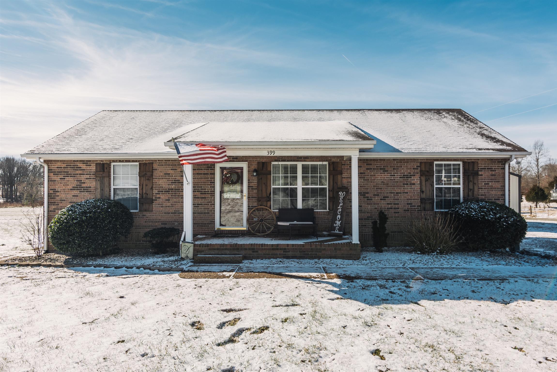 399 Corinth Road Portland, TN 37148 - Photo 28 of 28 a front view of a house with a yard