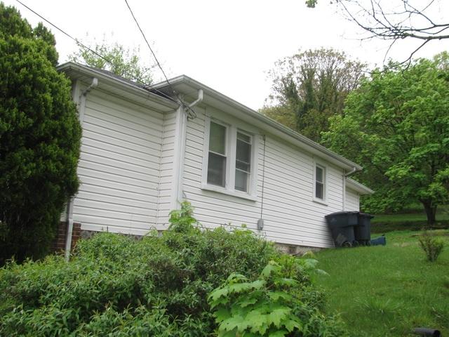 3641 Yellow Mountain Road Southeast Roanoke, VA 24014 - Photo 2 of 21 a view of a house with a yard