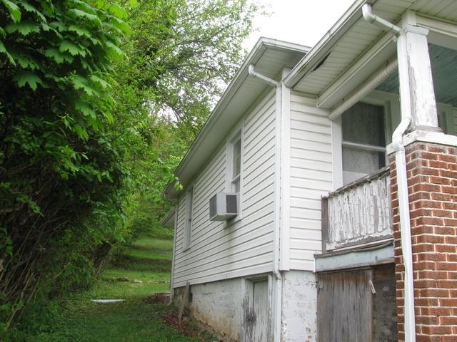 3641 Yellow Mountain Road Southeast Roanoke, VA 24014 - Photo 11 of 21 a view of a house with a yard and wooden fence