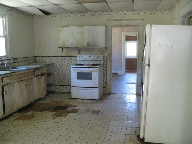 3641 Yellow Mountain Road Southeast Roanoke, VA 24014 - Photo 13 of 21 a kitchen with a stove sink and cabinets