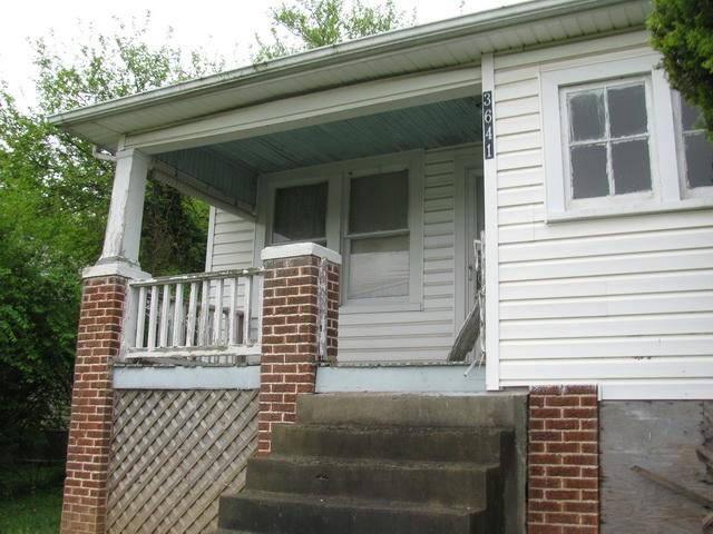3641 Yellow Mountain Road Southeast Roanoke, VA 24014 - Photo 8 of 21 a view of a house with a small yard