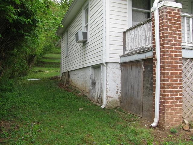3641 Yellow Mountain Road Southeast Roanoke, VA 24014 - Photo 10 of 21 a view of a house with a yard and garage
