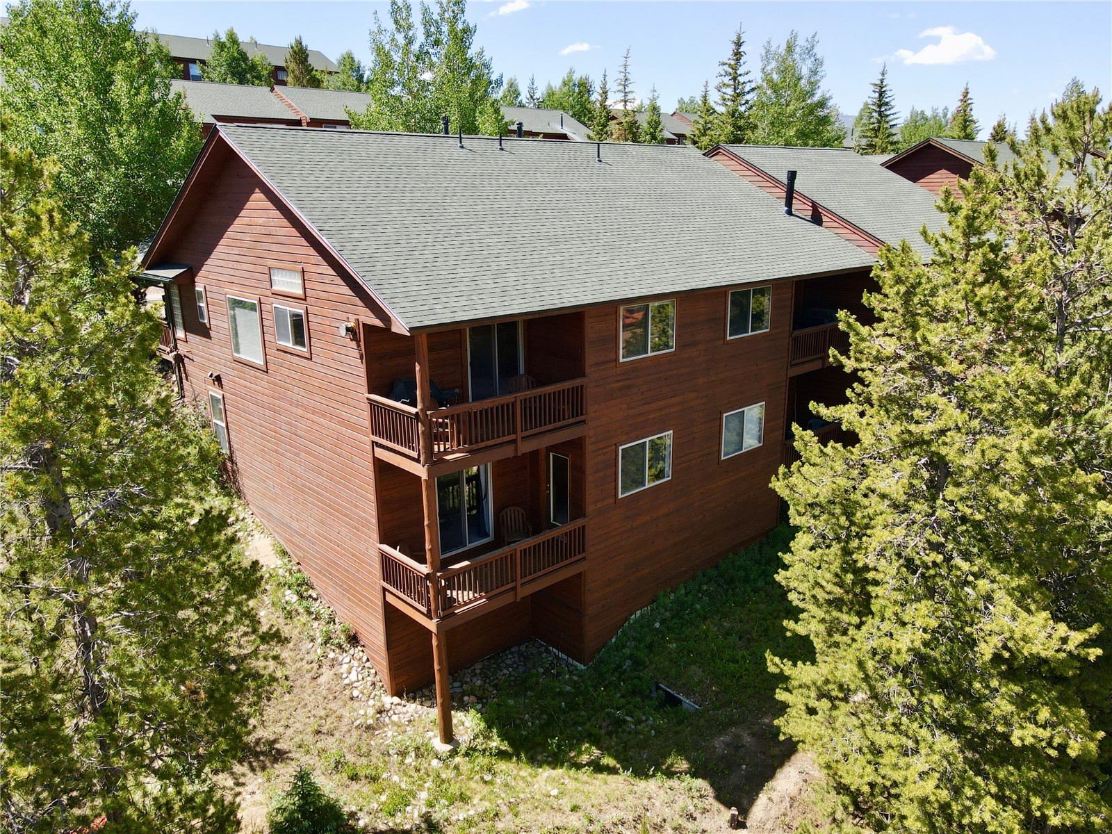 129 Lookout Ridge Drive, Unit 129 Dillon, CO 80435 - Photo 23 of 25 Back Of Home Showing Two Private Decks