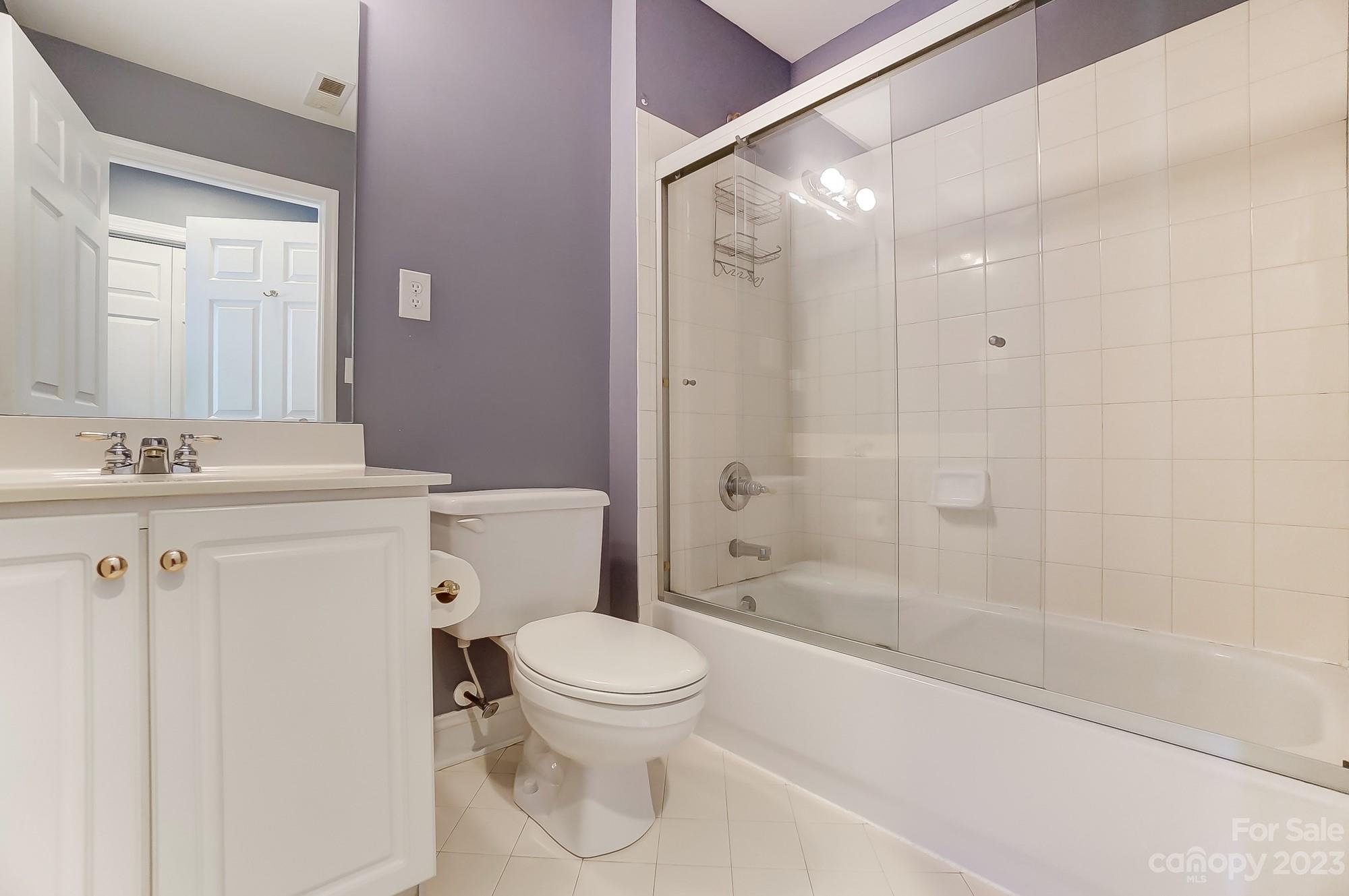 1617 Stevens Ridge Matthews, NC 28105 - Photo 28 of 42 a bathroom with a shower a toilet and a sink