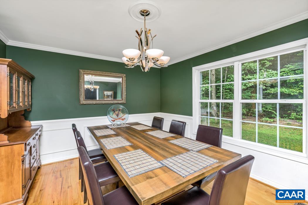 164 Wind Ridge Drive Ruckersville, VA 22968 - Photo 12 of 51 a view of a dining room with furniture window and outside view