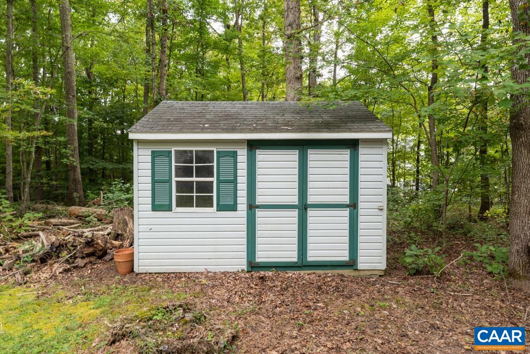 164 Wind Ridge Drive Ruckersville, VA 22968 - Photo 35 of 51 a house view with a backyard space