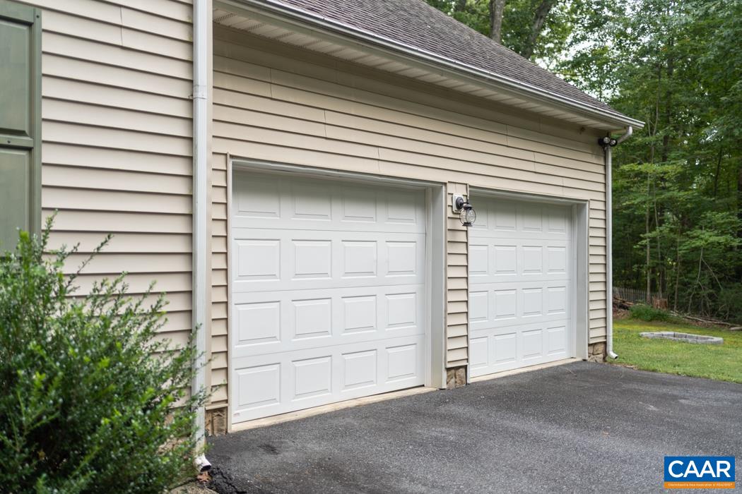 164 Wind Ridge Drive Ruckersville, VA 22968 - Photo 38 of 51 a view of a house with a garage