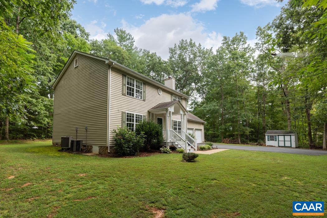 164 Wind Ridge Drive Ruckersville, VA 22968 - Photo 4 of 51 a view of a house with backyard