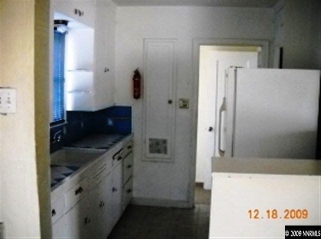 770 Vine Street Reno, NV 89503 - Photo 4 of 9 a bathroom with a sink and a mirror
