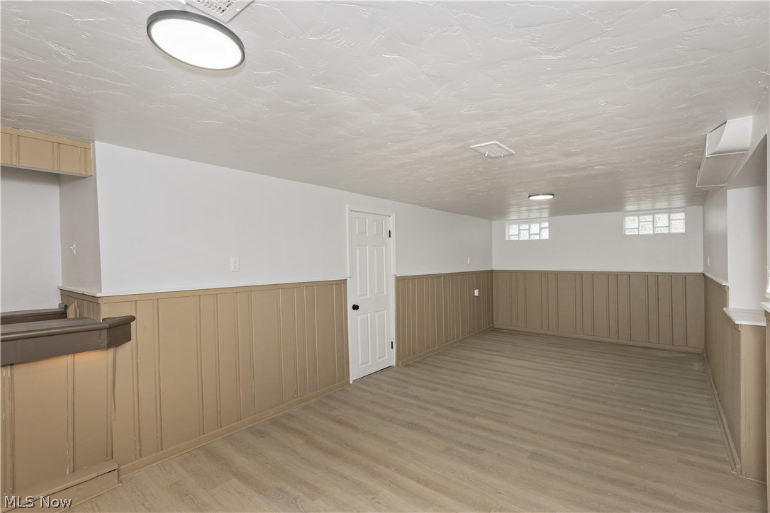 17917 McCracken Road Maple Heights, OH 44137 - Photo 39 of 48 Sprawling lower level recreation room w/ wet bar