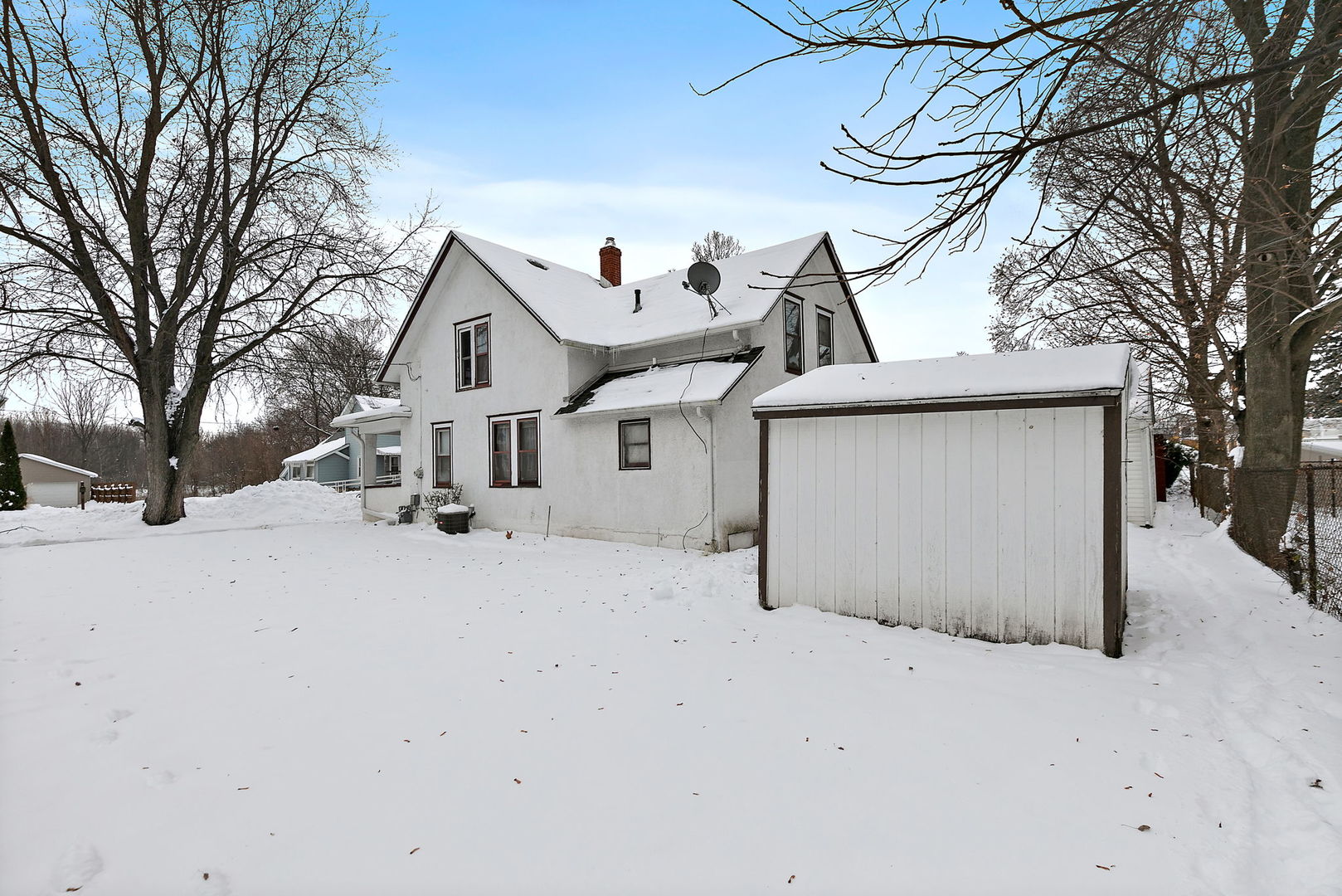 11824 Prairie Avenue Hebron, IL 60034 - Photo 21 of 22 a view of a house with a snow in the yard