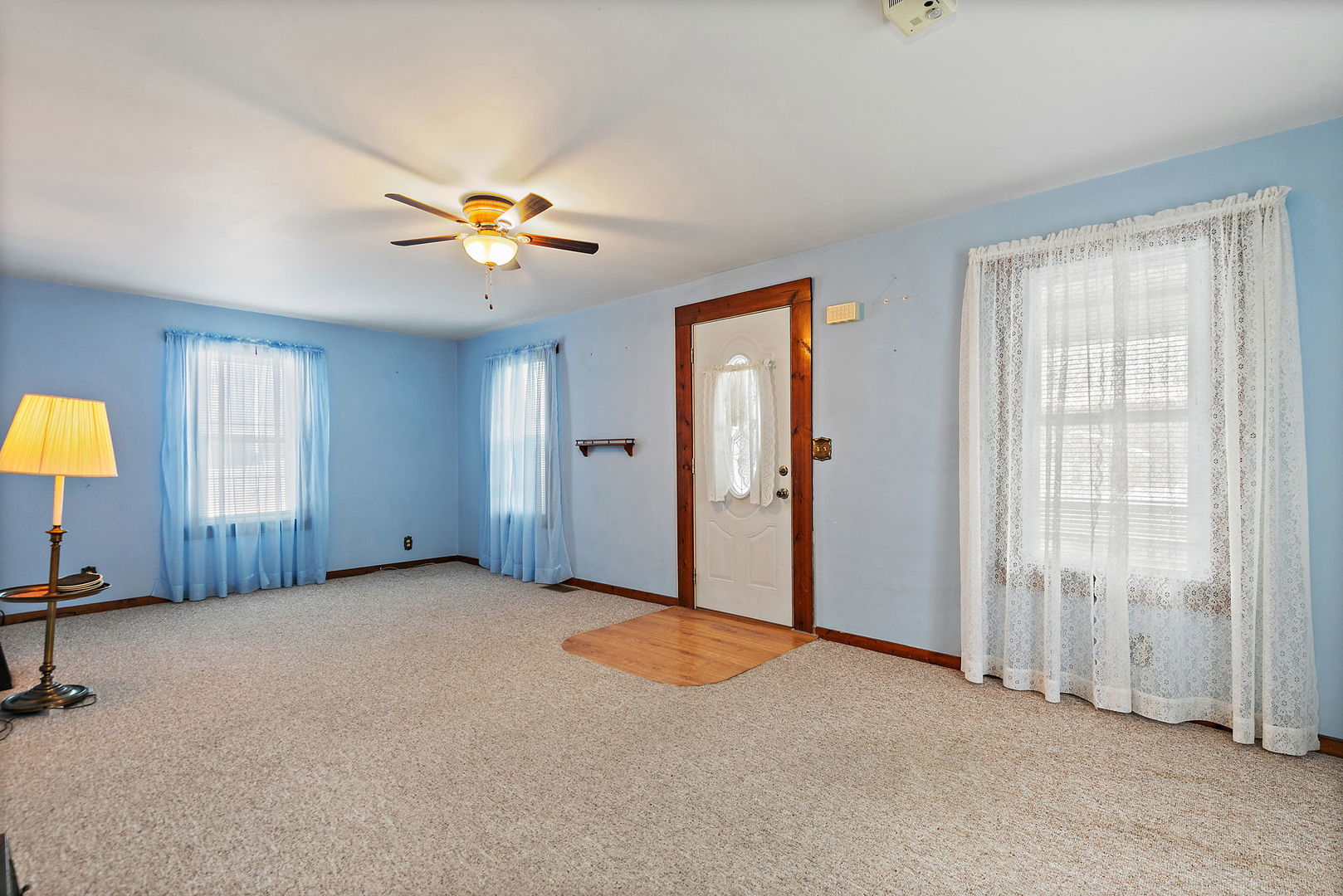 11824 Prairie Avenue Hebron, IL 60034 - Photo 5 of 22 an empty room with windows and fan