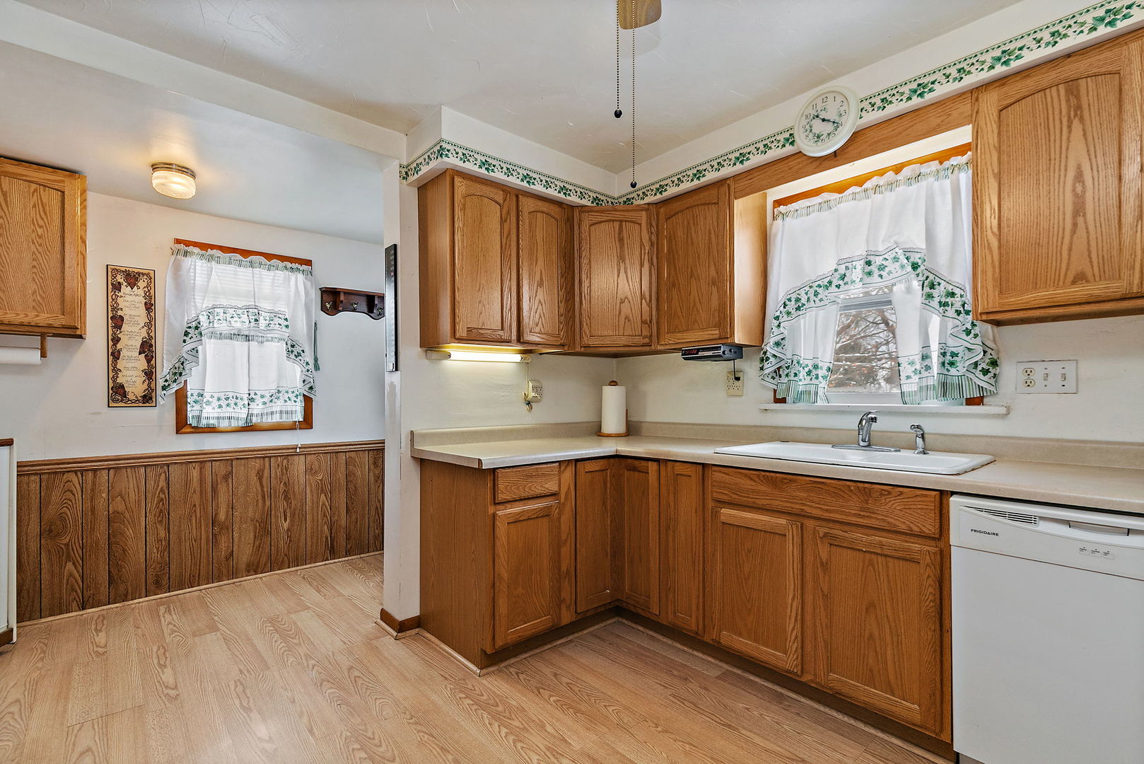 11824 Prairie Avenue Hebron, IL 60034 - Photo 10 of 22 a kitchen with sink cabinets and window