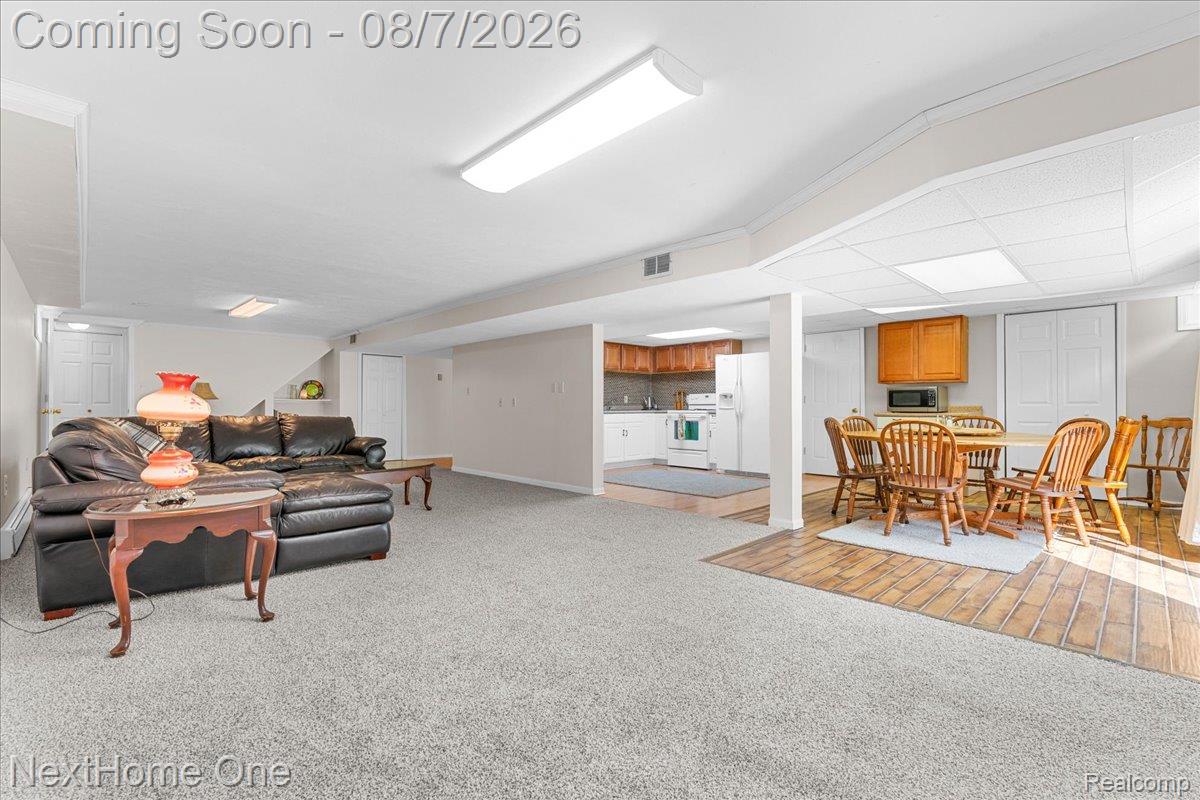 6260 Faussett Road Howell, MI 48855 - Photo 25 of 44 Finish the basement, living room, and dining area.