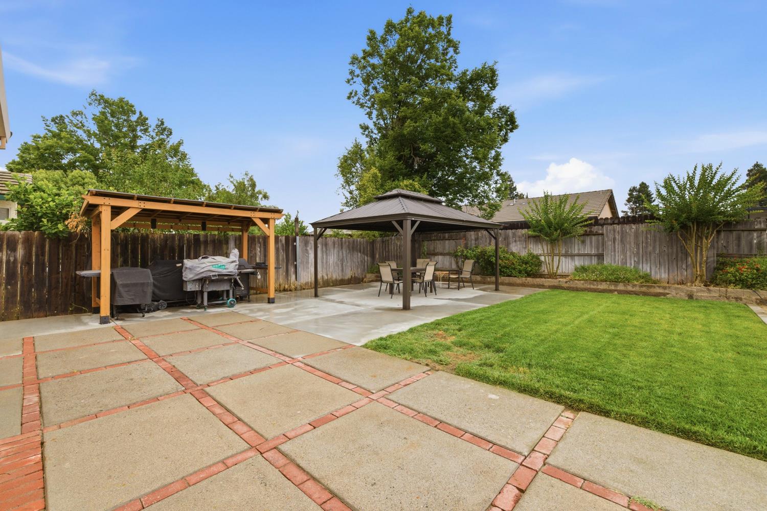 969 Colson Way Galt, CA 95632 - Photo 32 of 38 a front view of a house with a garden