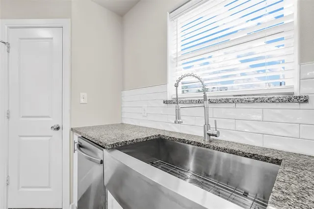 a view closed with a granite countertop sink