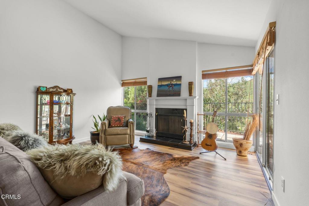 3907 United Road Agoura Hills, CA 91301 - Photo 12 of 34 a bedroom with furniture and a fireplace