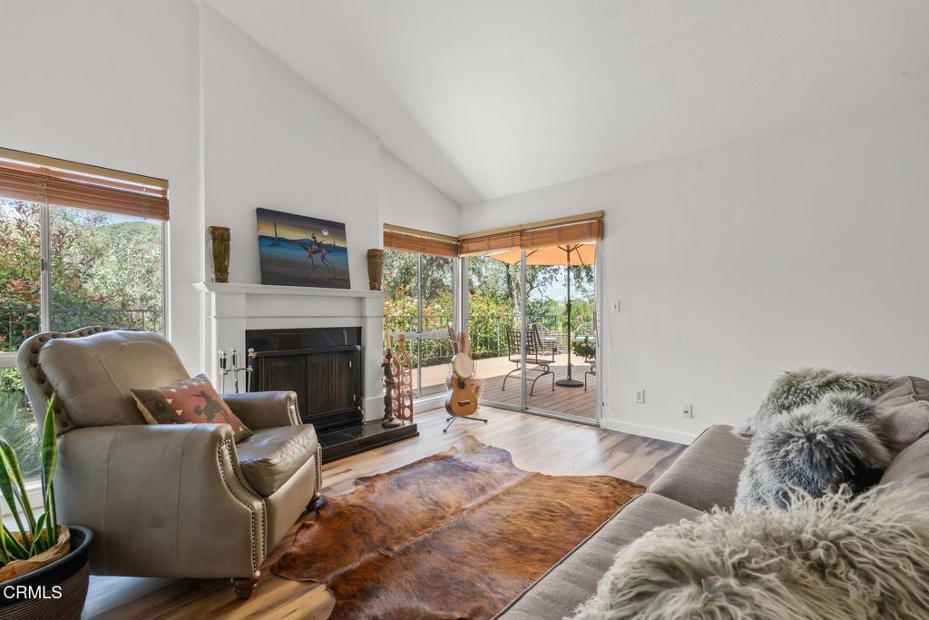 3907 United Road Agoura Hills, CA 91301 - Photo 13 of 34 a living room with furniture and a fireplace