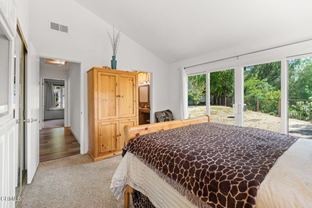 3907 United Road Agoura Hills, CA 91301 - Photo 15 of 34 a bed sitting in a bedroom next to a window