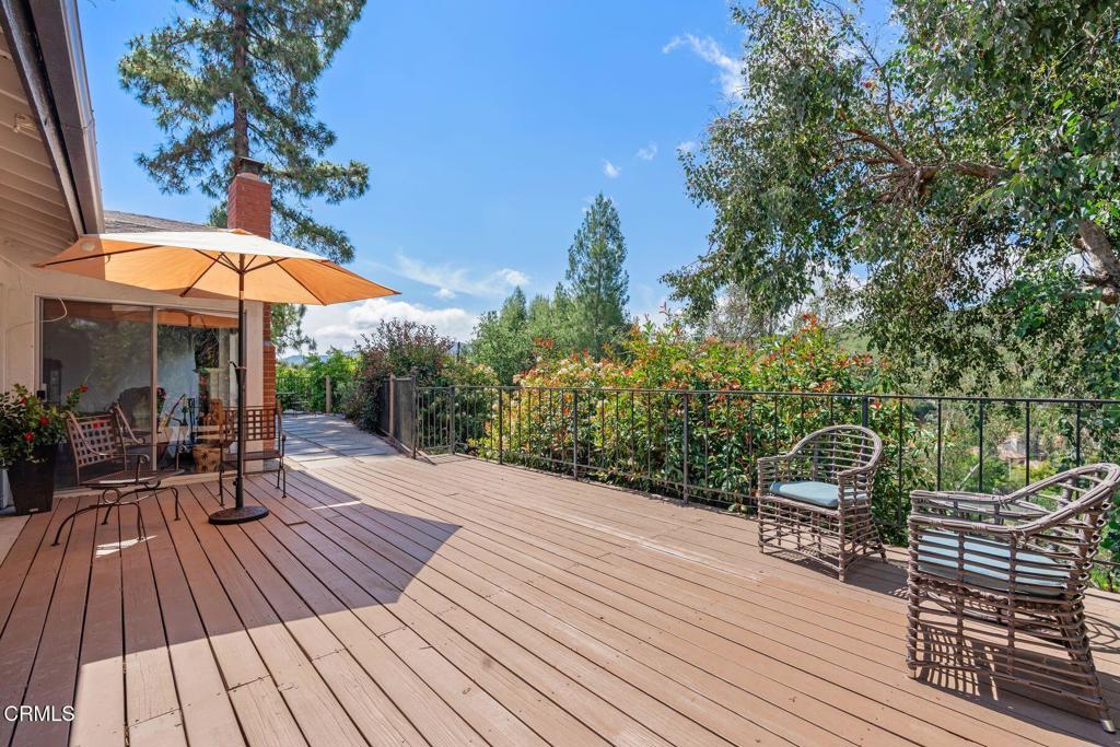 3907 United Road Agoura Hills, CA 91301 - Photo 22 of 34 a view of backyard with outdoor seating and wooden floor