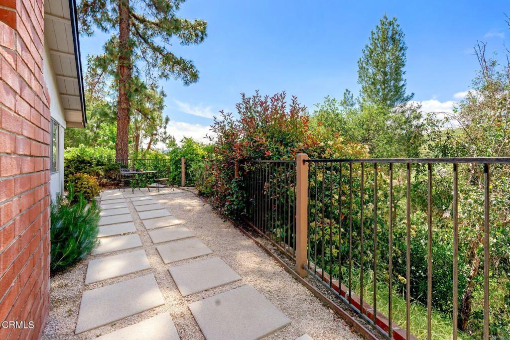 3907 United Road Agoura Hills, CA 91301 - Photo 24 of 34 a view of a pathway both side of building