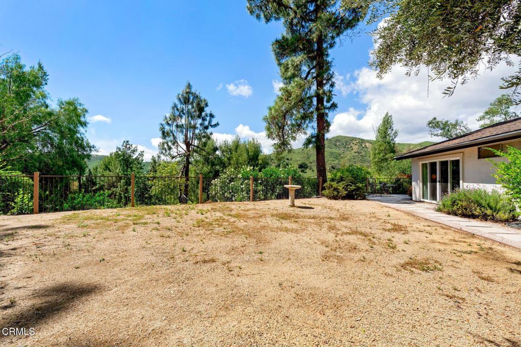3907 United Road Agoura Hills, CA 91301 - Photo 27 of 34 a view of a backyard of a house
