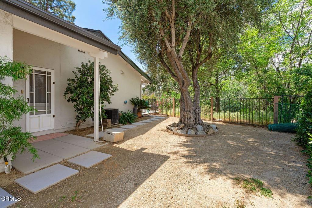 3907 United Road Agoura Hills, CA 91301 - Photo 29 of 34 a view of a house with backyard and tree