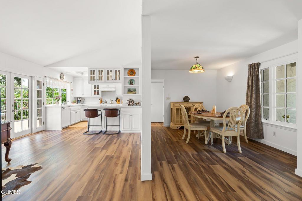 3907 United Road Agoura Hills, CA 91301 - Photo 7 of 34 a view of a dining room with furniture and wooden floor
