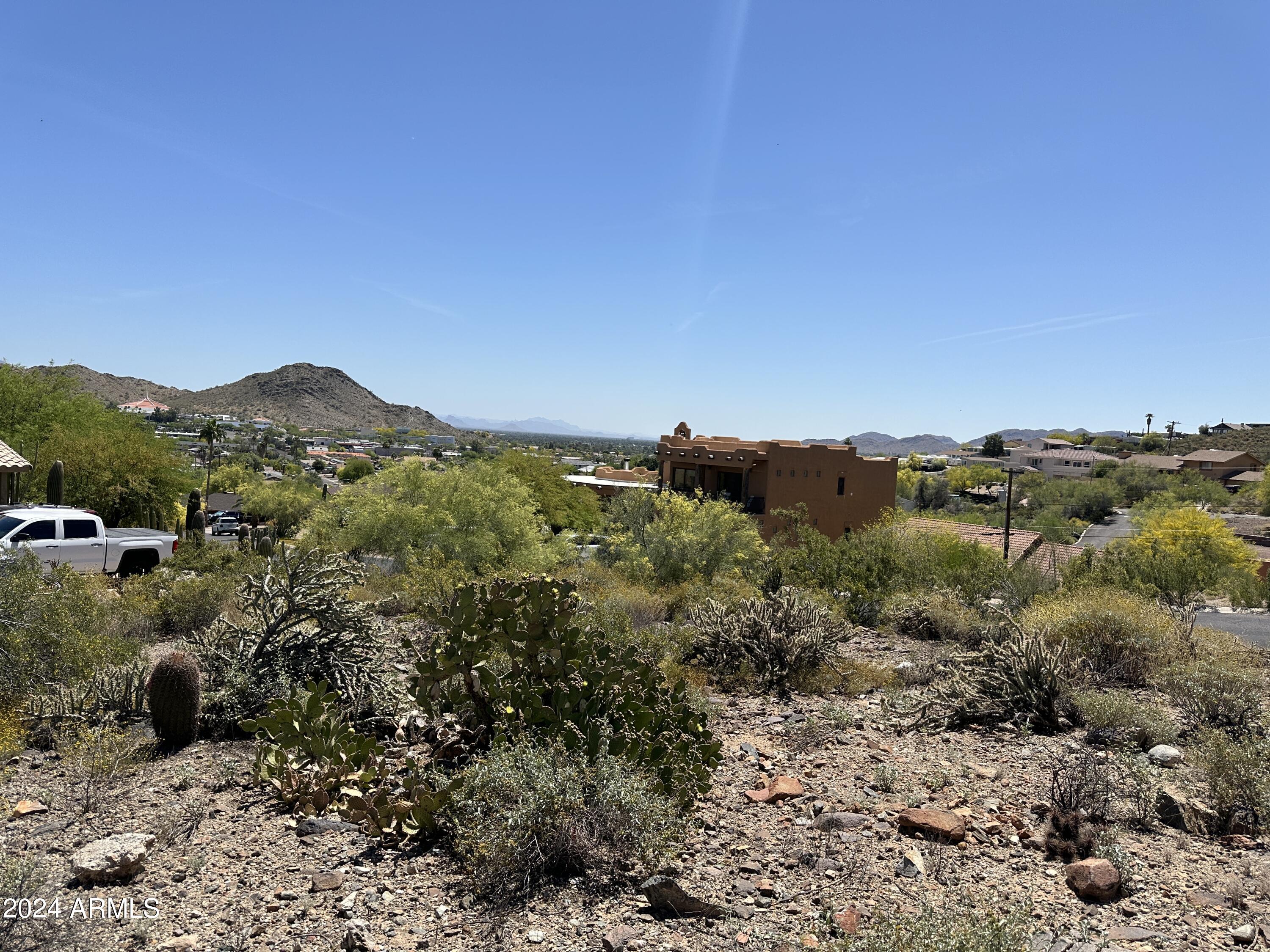 1702 East Calle Santa Cruz, Unit 29 Phoenix, AZ 85022 - Photo 11 of 15 a view of a mountain