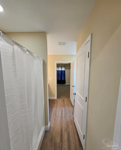 a view of an house with backyard porch and furniture