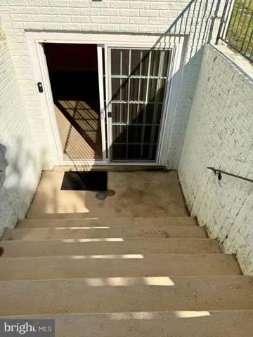 a view of balcony with wooden floor
