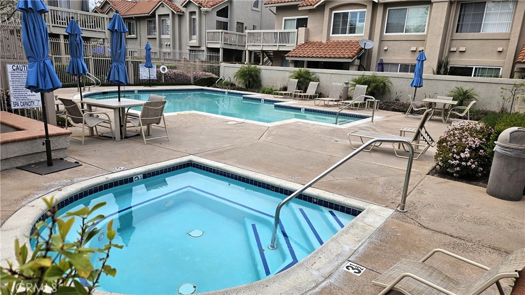 18922 Canyon Summit Lake Forest, CA 92679 - Photo 25 of 32 a view of a patio with chairs and tables