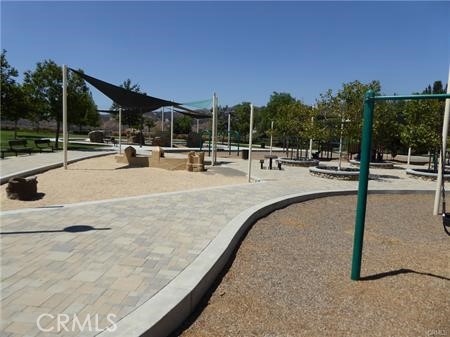 18922 Canyon Summit Lake Forest, CA 92679 - Photo 30 of 32 a view of a swimming pool with a patio