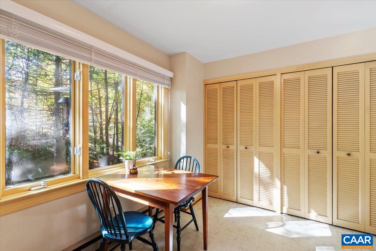 103 Vicar Court Charlottesville, VA 22901 - Photo 25 of 74 a view of a a dining room with furniture window and outside view