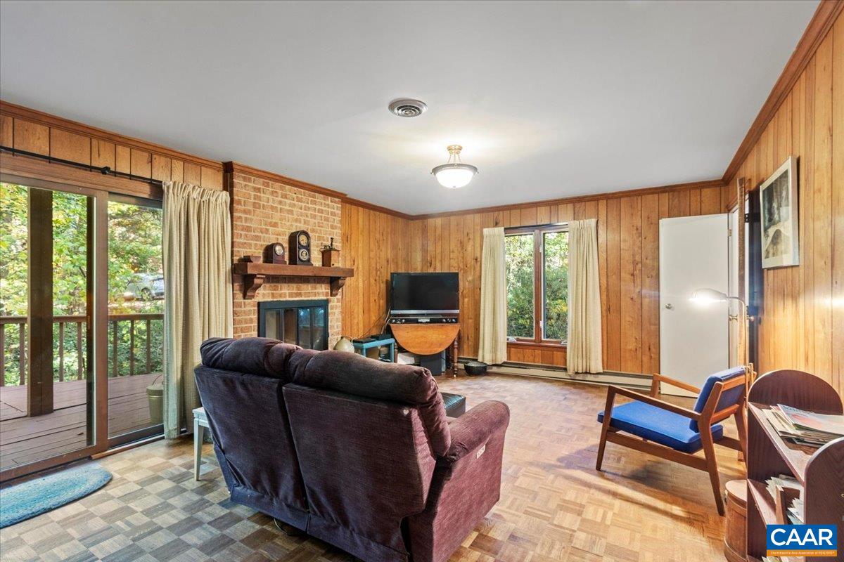 103 Vicar Court Charlottesville, VA 22901 - Photo 28 of 74 a living room with furniture and a large window