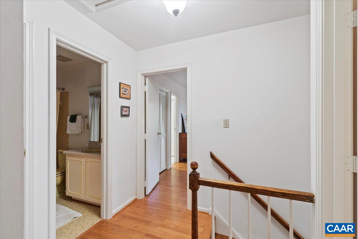 103 Vicar Court Charlottesville, VA 22901 - Photo 39 of 74 a view of a hallway with wooden floor and entryway