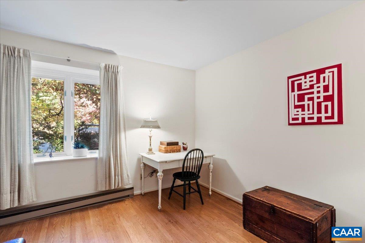 103 Vicar Court Charlottesville, VA 22901 - Photo 50 of 74 a workspace with furniture and a window