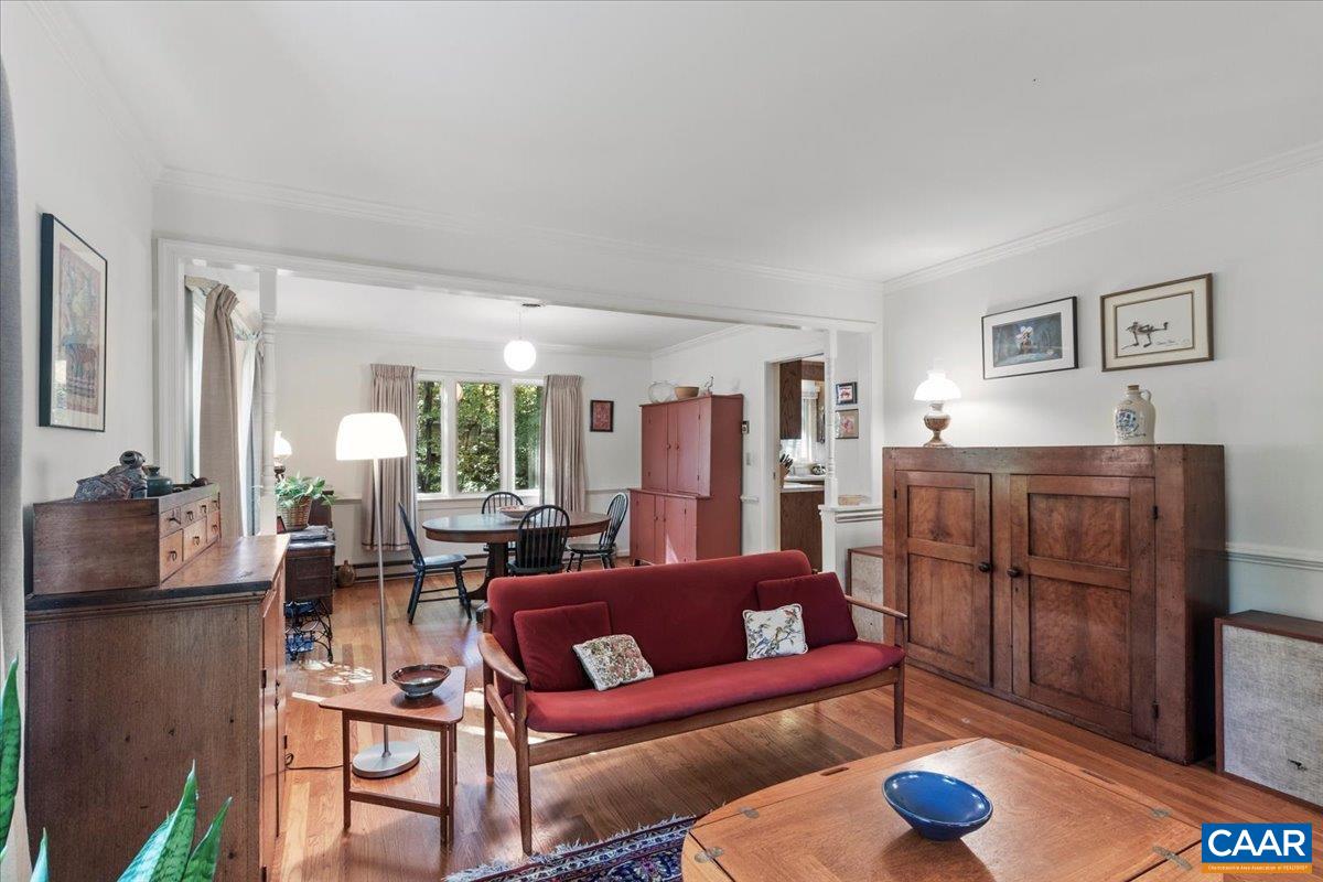 103 Vicar Court Charlottesville, VA 22901 - Photo 9 of 74 a living room with furniture a rug and a large window