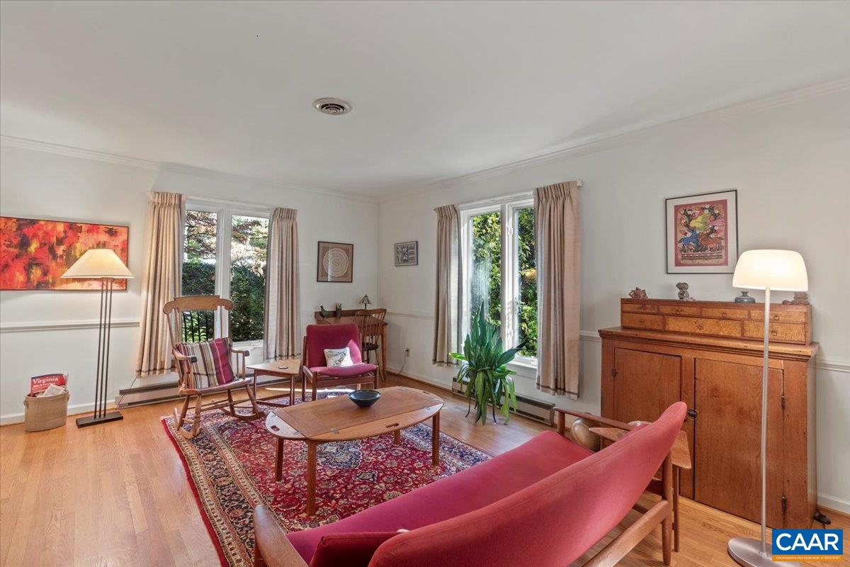 103 Vicar Court Charlottesville, VA 22901 - Photo 10 of 74 a living room with furniture a flat screen tv and a table