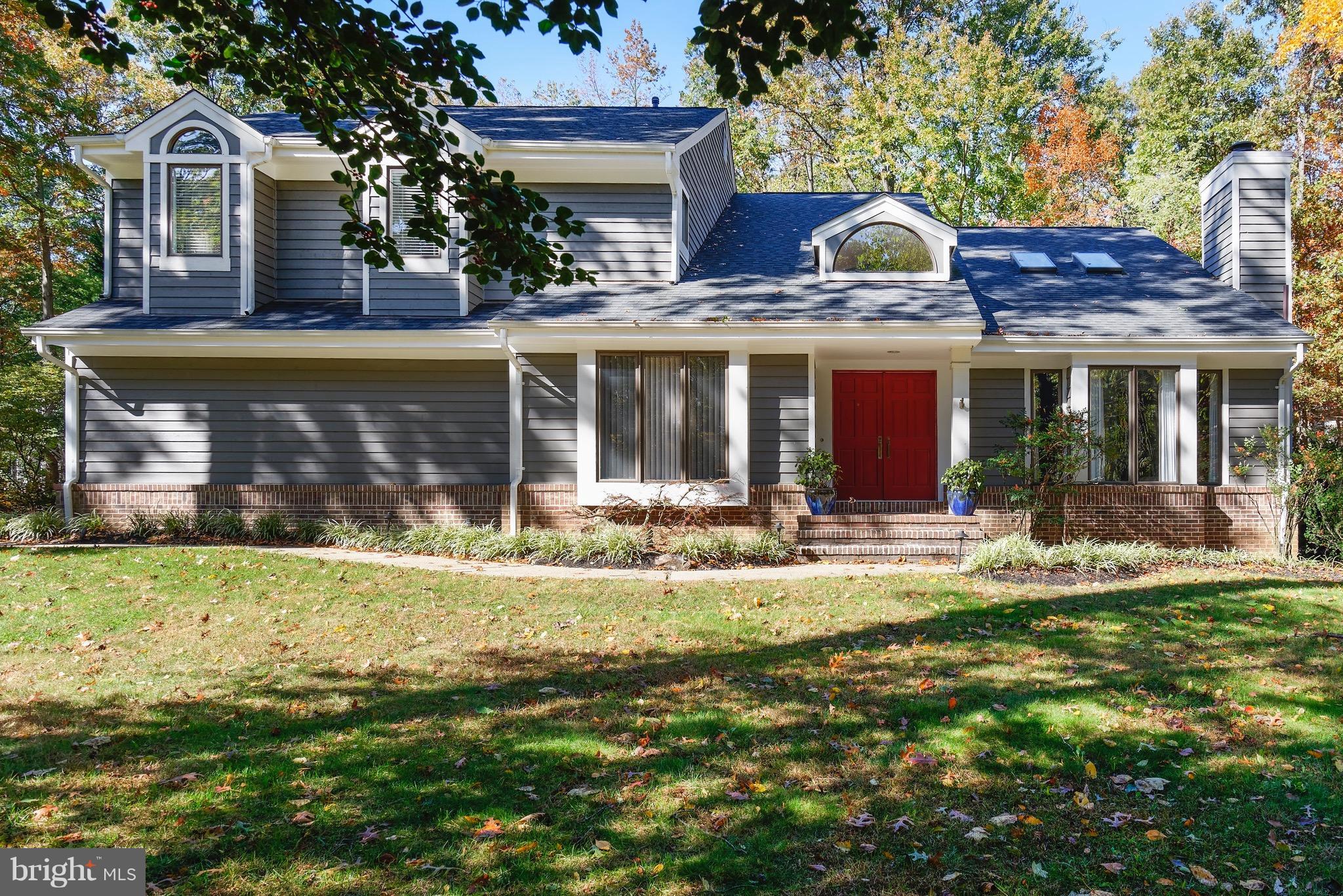 11400 Fieldstone Lane Reston, VA 20191 - Photo 1 of 28 front view of a house with a yard
