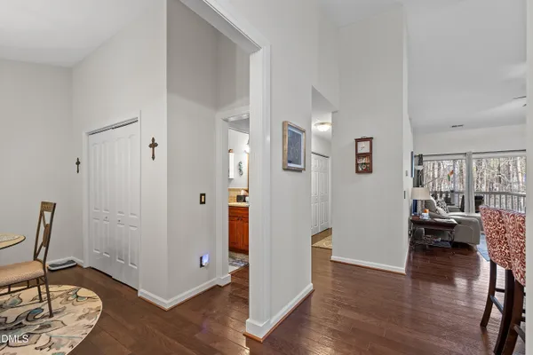 a view of a livingroom with furniture and hardwood floor