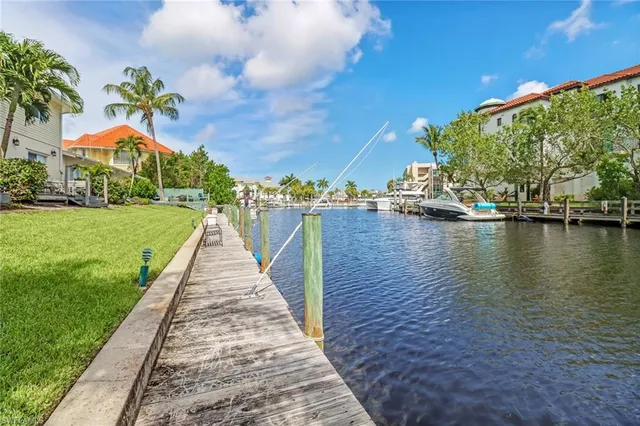 a view of a lake with a building in the background