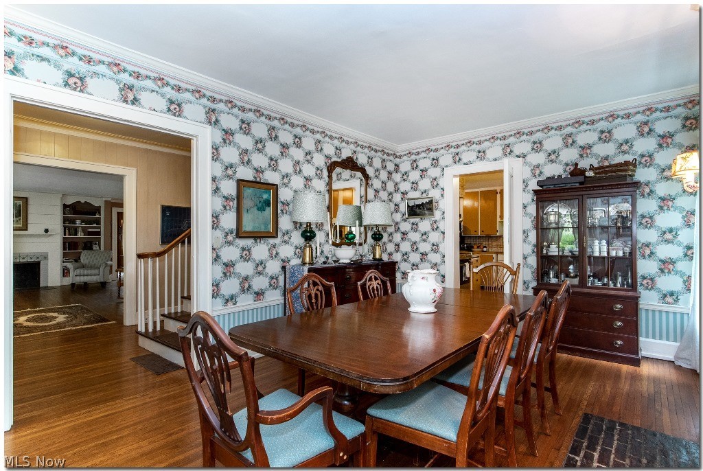 2762 Som Center Road Cleveland, OH 44124 - Photo 8 of 32 Formal Dining Room with Hardwood Floors and Fireplace